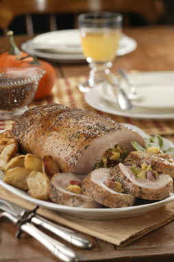 APPLE AND CORNBREAD-STUFFED PORK LOIN WITH ROASTED APPLE GRAVY