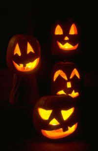Four Carved Pumpkins
