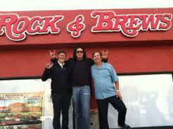Dave Furano, Gene Simmons and Michael Zislis celebrate the launch of their restaurant venture, Rock & Brews